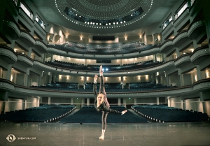 Meanwhile, in Charlotte, NC, dancer Hannah Rao warms up at the Belk Theater of the Blumenthal Performing Arts Center. (Photo by Principal Dancer Kaidi Wu)